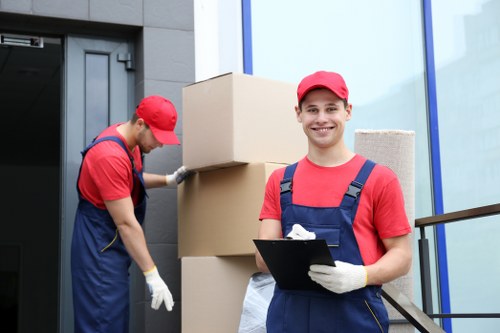 Man and van vehicle loading household items for transport