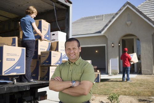 Moving day checklist and packed boxes ready for transport
