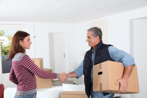 Prepared boxes and furniture ready for a man with van service in Watford