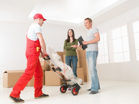 Organised office boxes and furniture prepared for transfer