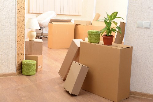 Loading furniture and boxes into a van for a Watford move