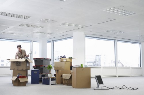 Local removals team handling furniture in Watford